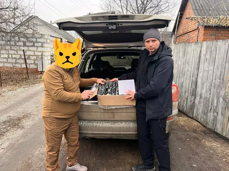 MP Foundation delivery — Brigade signing for received kits.